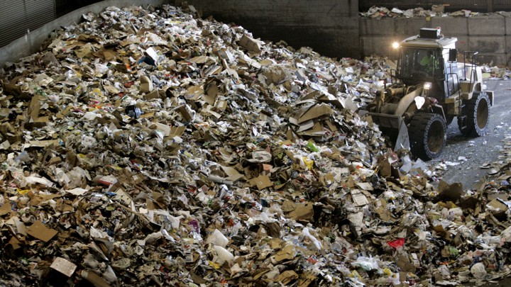 Trash being recycled in a trash dump facility